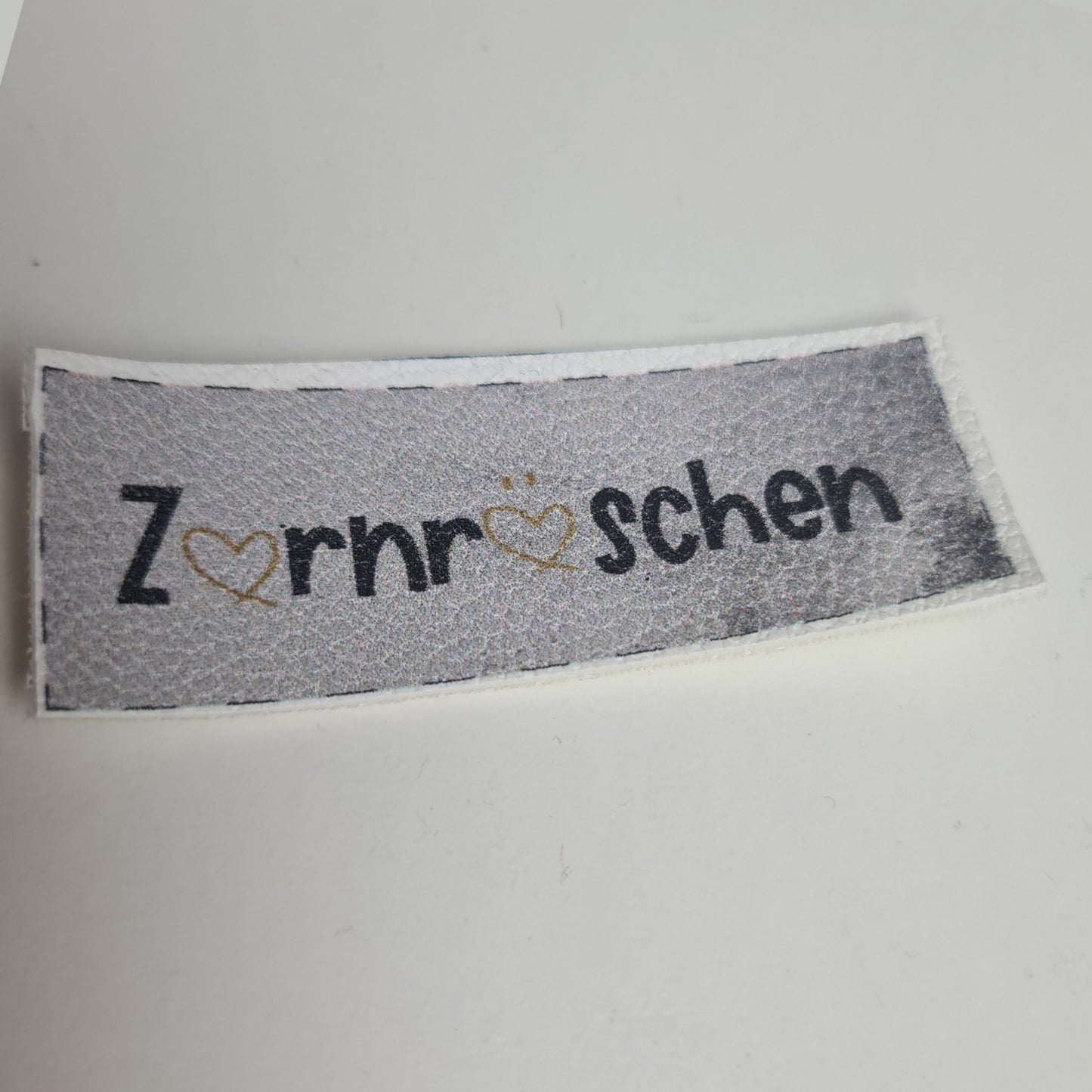 Kunstlederlabel - Zornröschen Grau