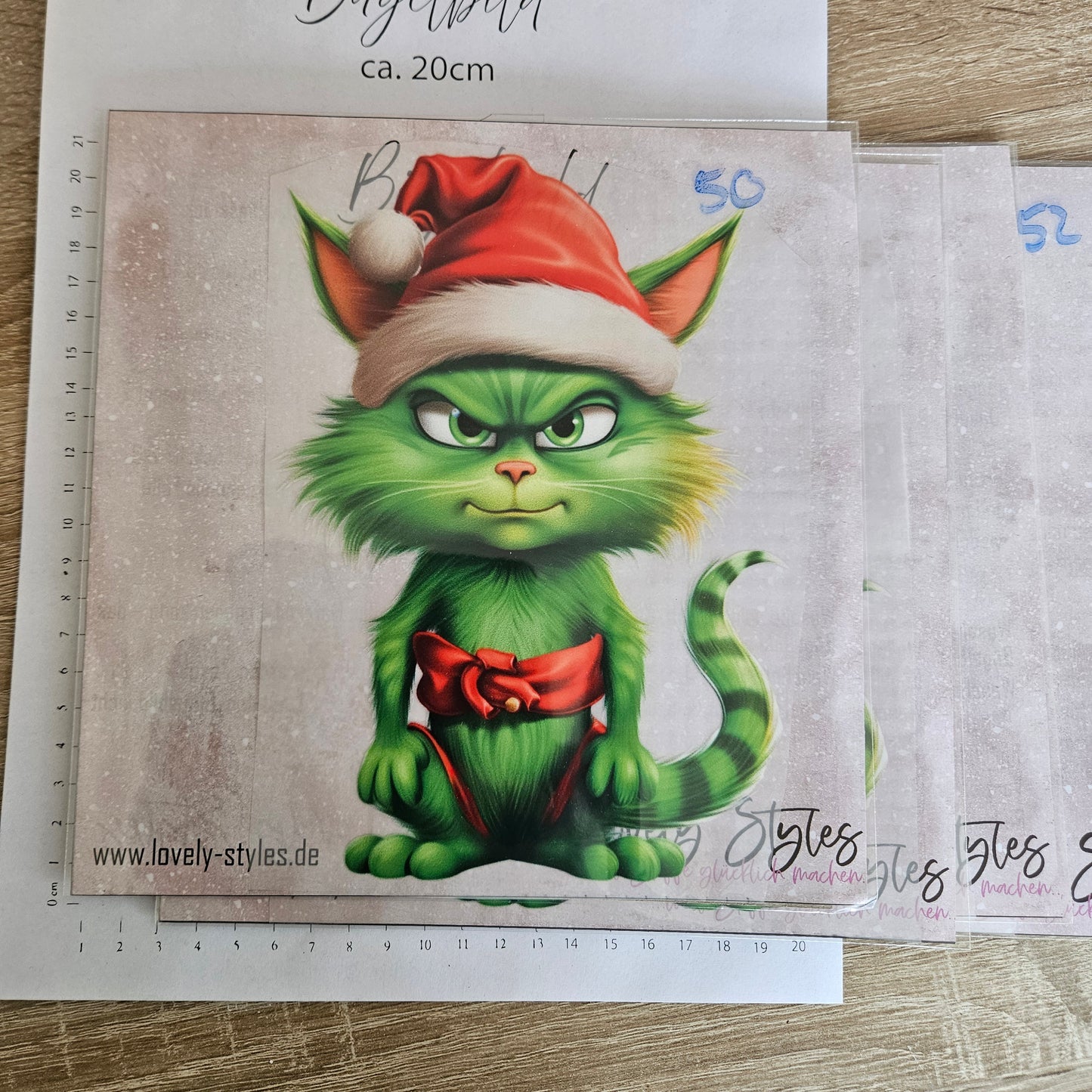 Bügelbild - ca. 20cm - Grüne Katze Weihnachtsmütze