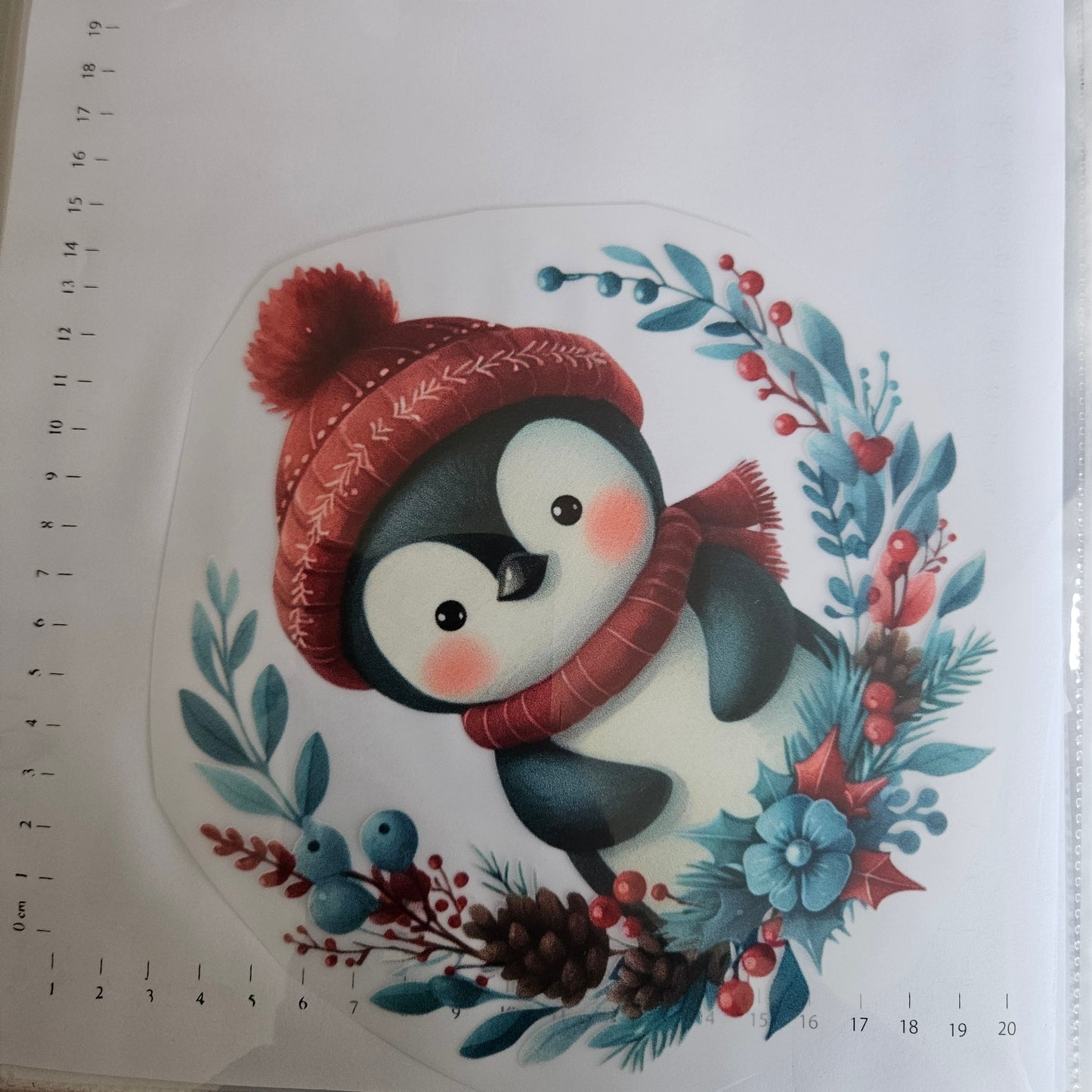 Bügelbild - ca. 20cm - Pinguin im Kranz