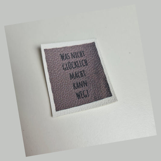 Kunstlederlabel - Was nicht glücklich macht... Braun