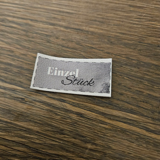 Kunstlederlabel - EinzelStück Grau