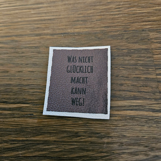 Kunstlederlabel - Was nicht glücklich macht... Braun