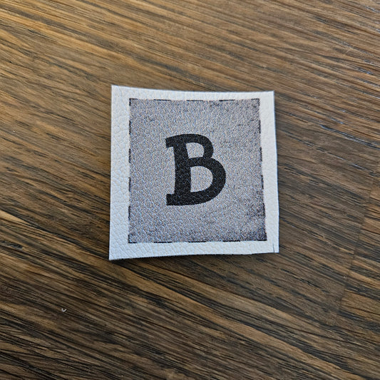 Kunstlederlabel - Buchstaben